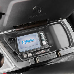 EDBETOS tray in a Challenger during a road trip keeping essentials secure
