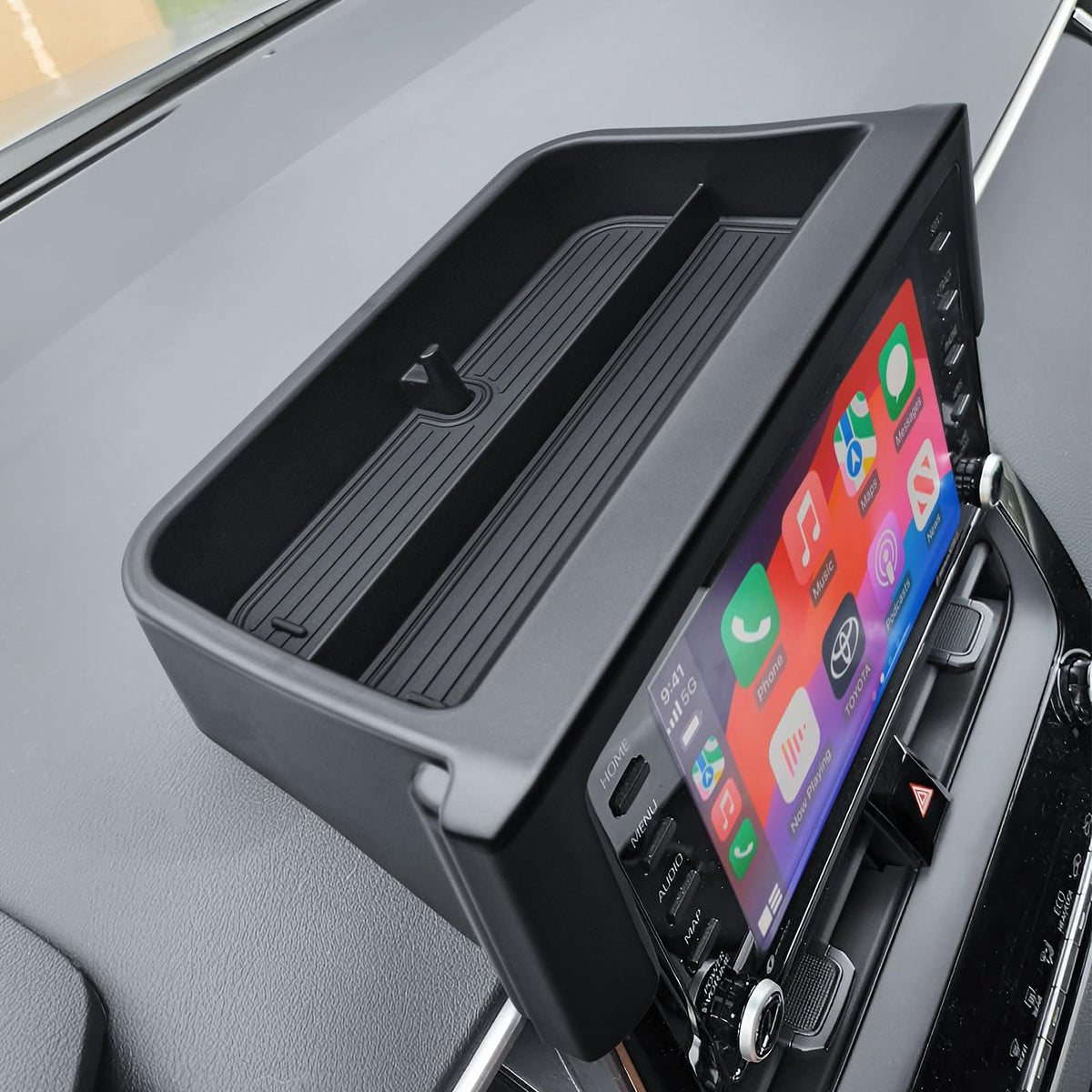 EDBETOS console with items organized keys sunglasses cables demonstrating better accessibility