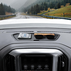 EDBETOS lifestyle shot inside truck showing organized dashboard and tidy cabin