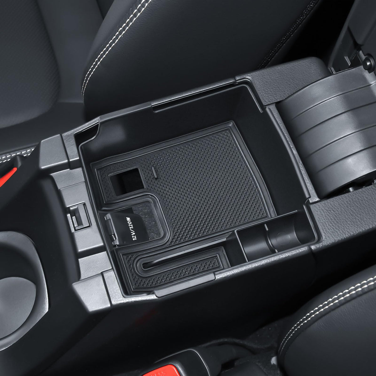 EDBETOS dashboard storage holding a phone and cards for secure, reach-in convenience