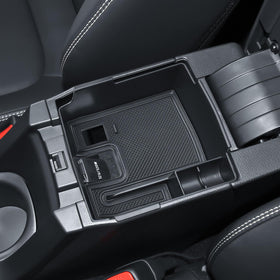 EDBETOS dashboard storage holding a phone and cards for secure, reach-in convenience