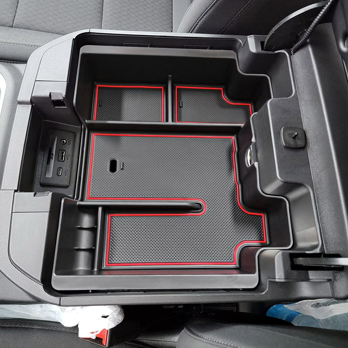 EDBETOS front view of console tray showing tidy upper and lower storage benefit