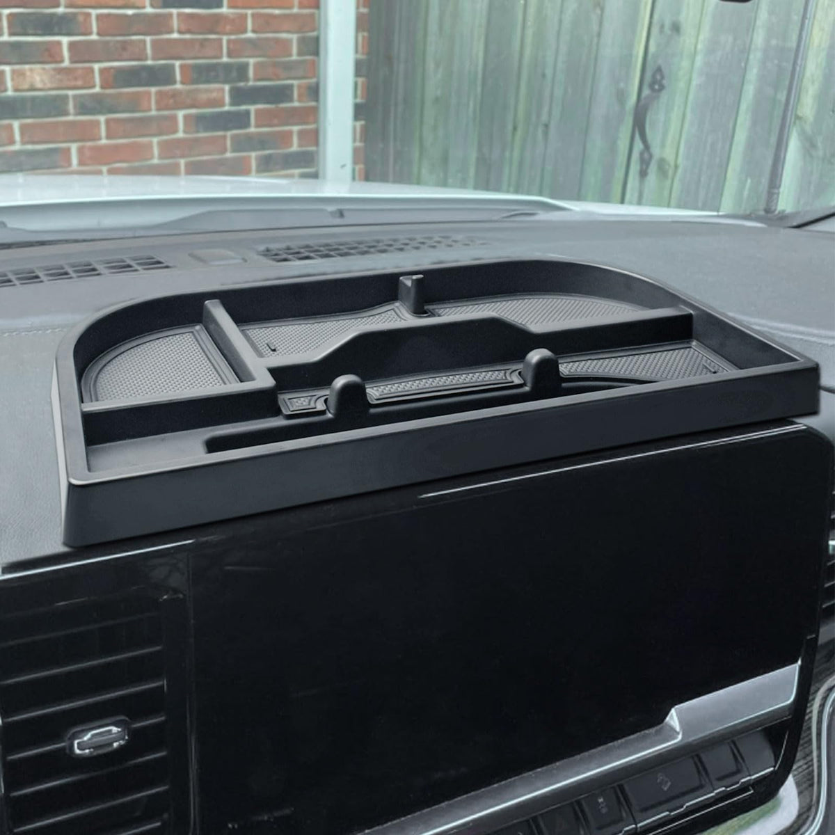 EDBETOS front view installed behind 13.4-inch screen shows neat storage benefit