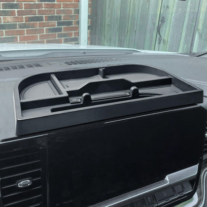 EDBETOS front view installed behind 13.4-inch screen shows neat storage benefit