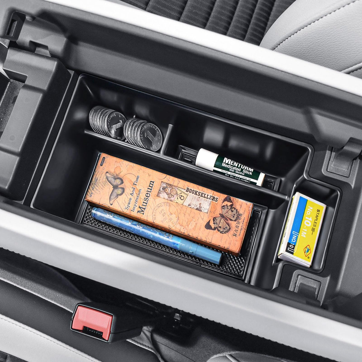 EDBETOS installed in a Nissan Rogue console showing tidy storage benefit