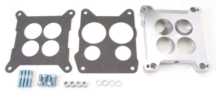 Edelbrock adapter front face showing bolt pattern and ports for correct alignment and fit