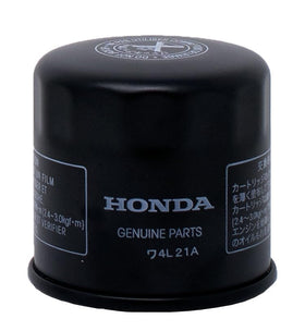Funnel and oil filter wrench in use on a Rebel 500, speeds up service and reduces spills