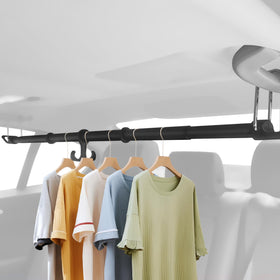 Elantrip full view installed in SUV showing tidy hanging clothes benefit