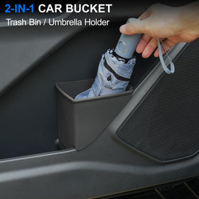 ELECFRESH trash can next to hand for scale showing compact size and convenience