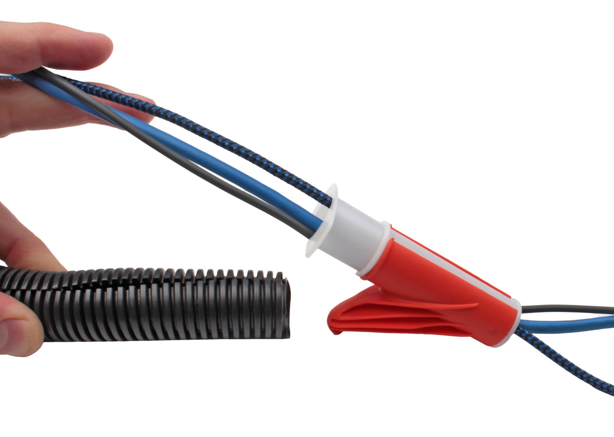 Electriduct next to ruler showing scale for choosing correct insertion size
