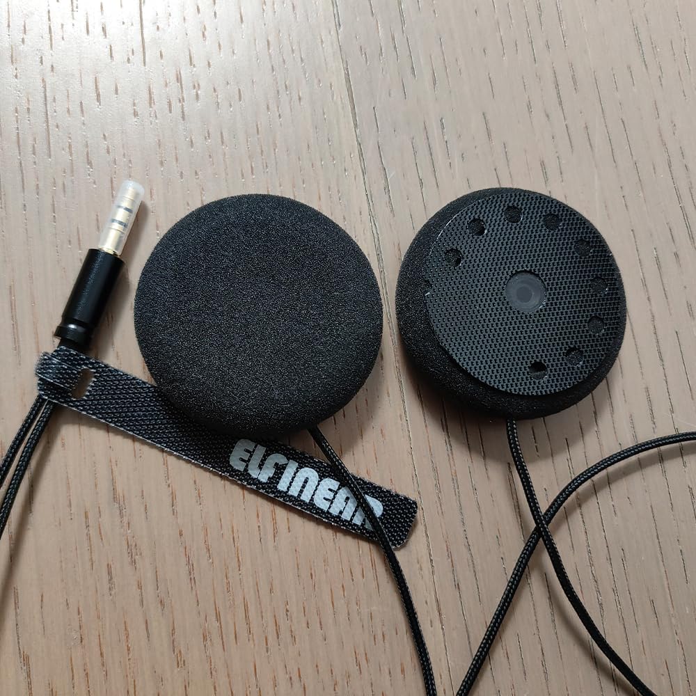 ELFINEAR speaker next to a coin size comparison illustrating compact powerful drivers