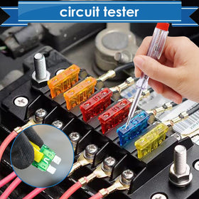 Eoppen replacing a fuse inside a car fuse box for fast roadside electrical repair