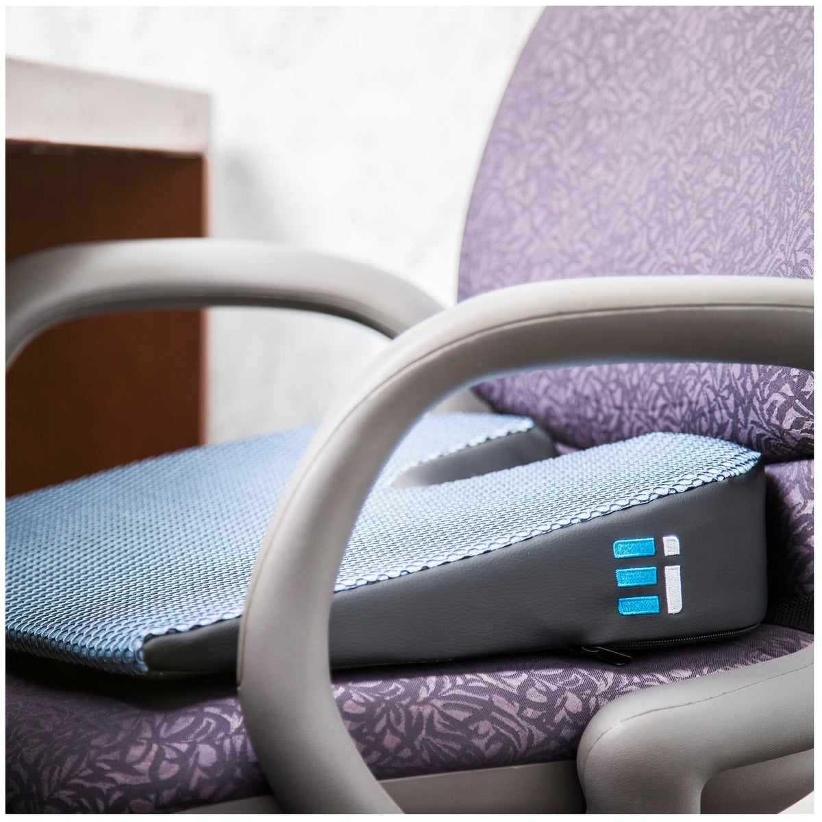 Ergonomic Innovations cushion installed in car seat illustrating driving comfort