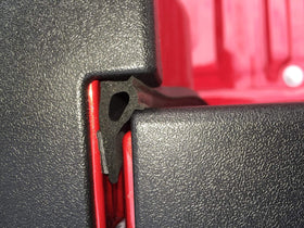 ESI seal adhered to spray-on bedliner demonstrating surface grip