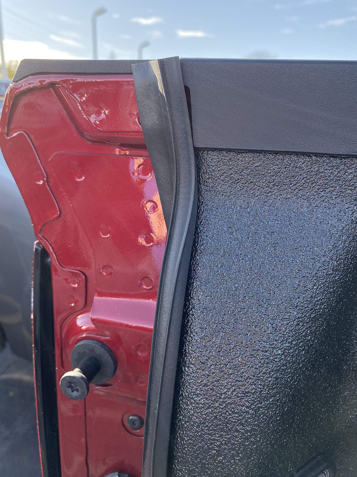 ESI tailgate seal installed on GMC Sierra demonstrating reduced dust entry benefit
