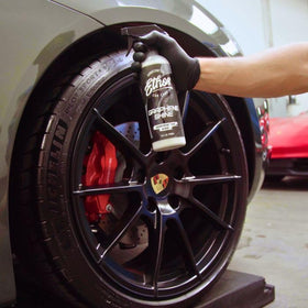 Ethos Handcrafted Car Care being sprayed onto tire showing high sheen