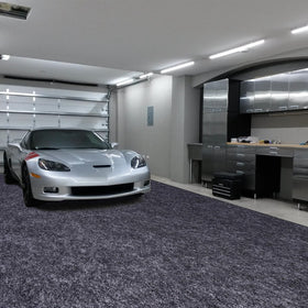 Evercomfy mat installed under car demonstrating scale and floor protection