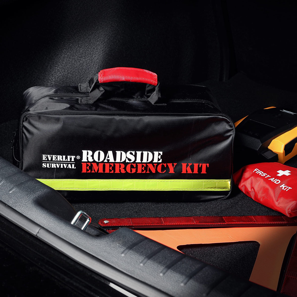 EVERLIT nighttime roadside setup with triangle and flashlight boosting visibility
