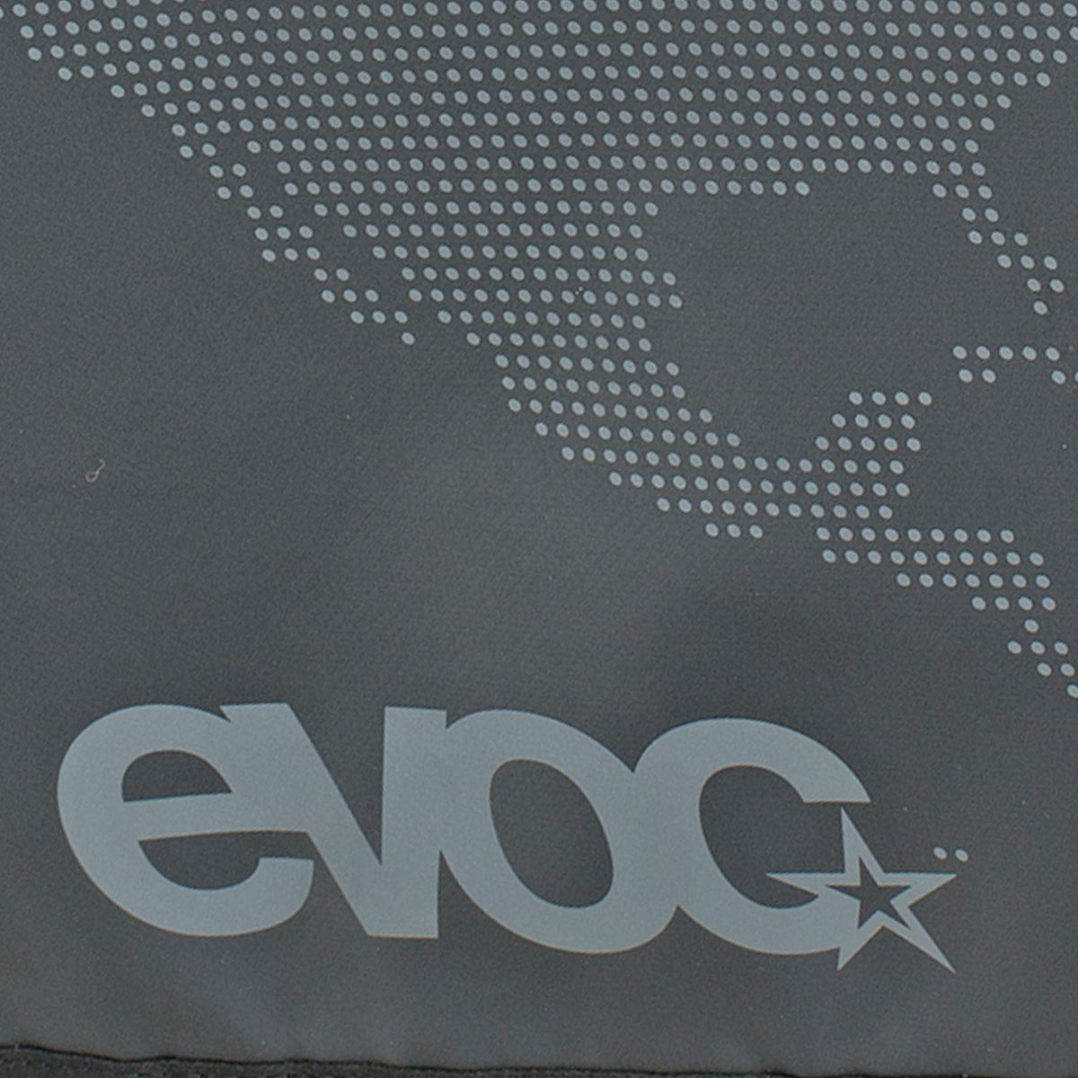 EVOC tailgate pad installed on pickup demonstrating secure bike transport