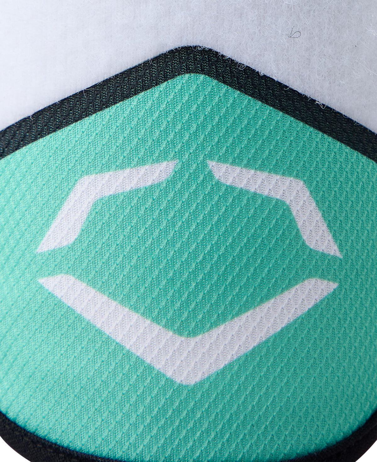 EvoShield Seafoam guard beside ruler to show 8x5 inch size
