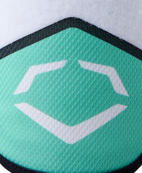 EvoShield Seafoam guard beside ruler to show 8x5 inch size