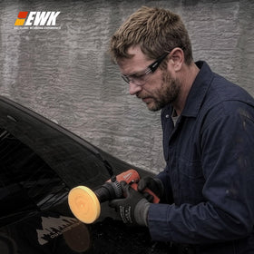 EWK wheel mounted on drill demonstrating fast adhesive removal