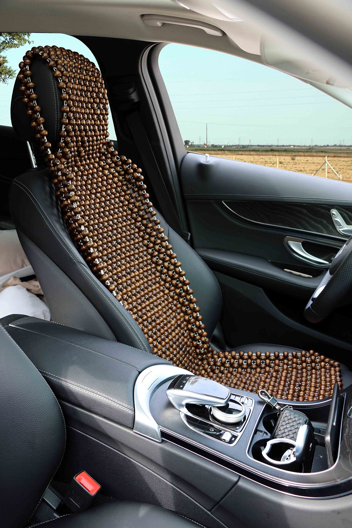 EXCEL LIFE close-up of natural wood bead texture highlighting breathability and gentle massage