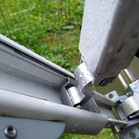 EXCELFU slider installed on awning arm demonstrates restored canopy tension and safety
