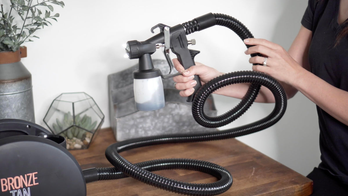 Existing Beauty gun being used in a salon setting delivering smooth, professional mist