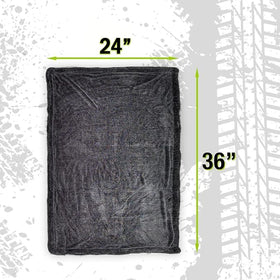 ExoForma folded towel next to ruler showing 24x36 size for faster drying