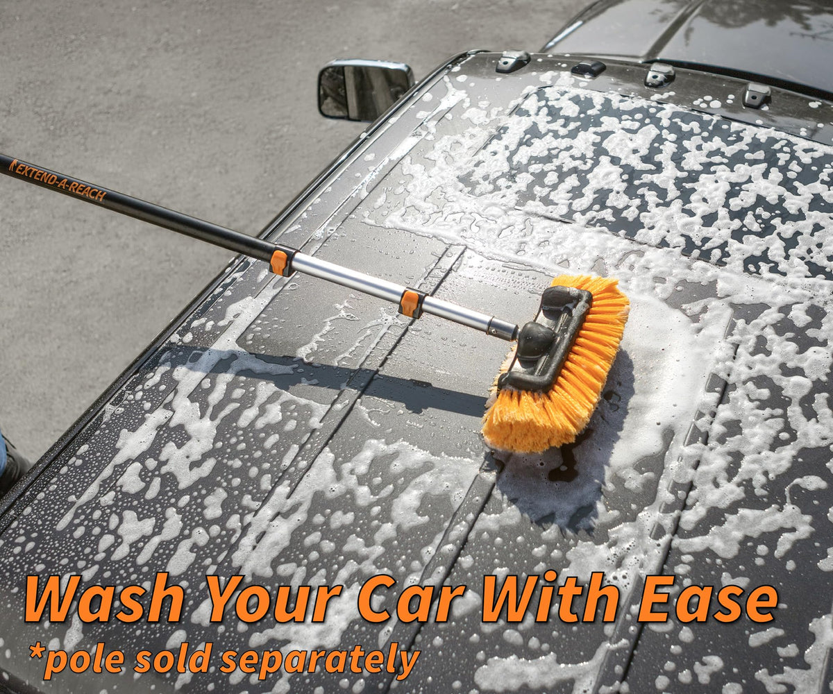 EXTEND-A-REACH brush attached to extension pole in use reaching car roof for effortless high-reach cleaning