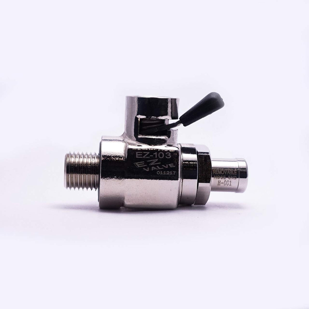EZ Oil Drain Valve next to common wrench for scale showing compact size and easy hand-install