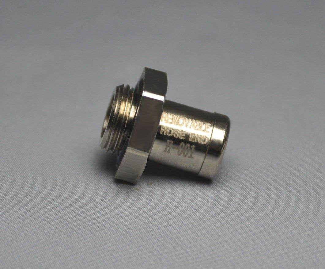 EZ Oil Drain Valve attached with hose draining oil cleanly into a catch pan for no-spill changes