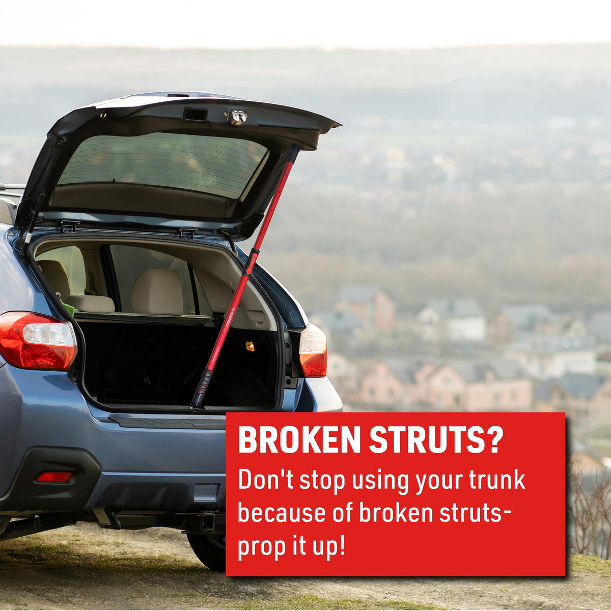 EZRED holding a car hood open for hands-free repair convenience