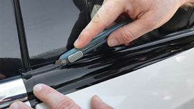 EZAUTO WRAP applied to interior console for modern gloss styling