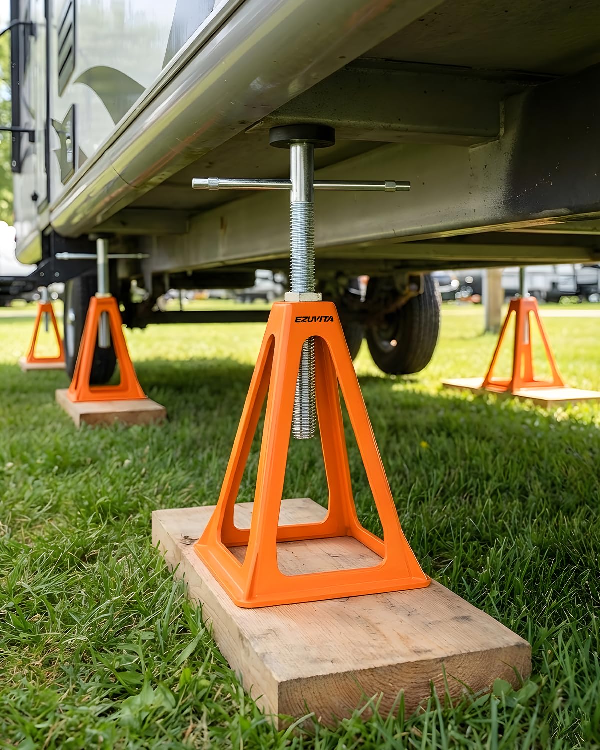 EZUVITA hand holding jack for scale showing lightweight portability and easy handling