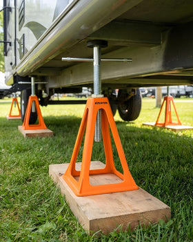 EZUVITA hand holding jack for scale showing lightweight portability and easy handling