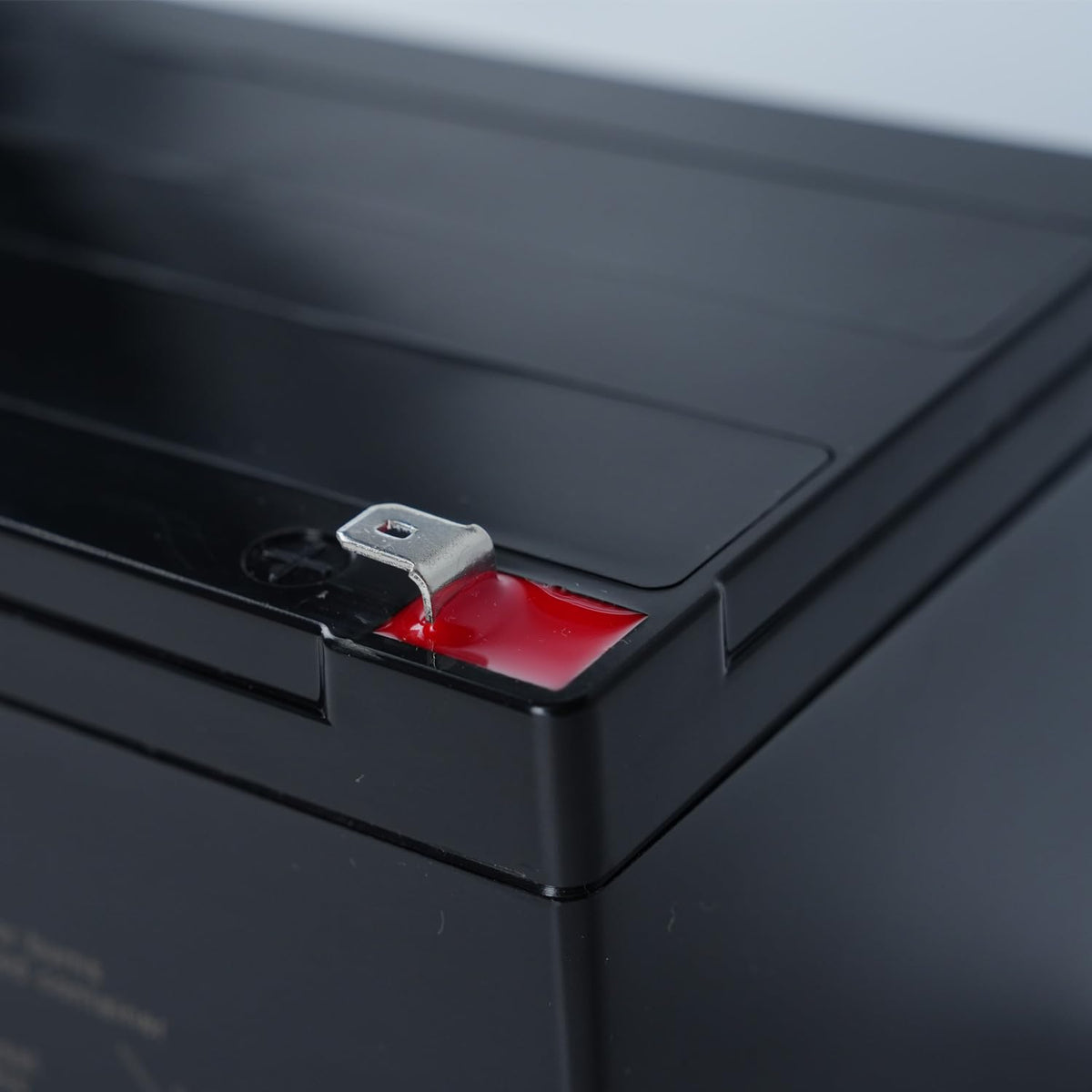 FACJOYMOOU battery on charger in family room demonstrating safe convenient charging