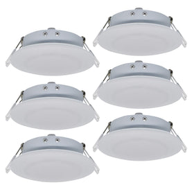 Facon puck light front view showing warm glow and clean bezel benefit ambient lighting