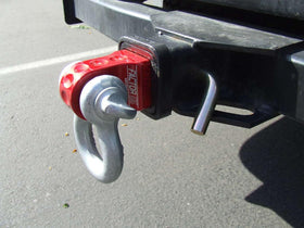 Factor 55 Hitchlink beside ruler showing dimensions and easy portability benefit