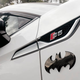 Fan Emblems Batman badge applied to laptop showing personalization and style