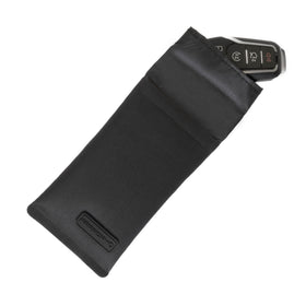Faraday Defense on glovebox shelf demonstrating vehicle security storage