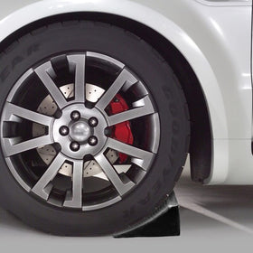 Fasmov chock used with trailer wheel improving stability during loading