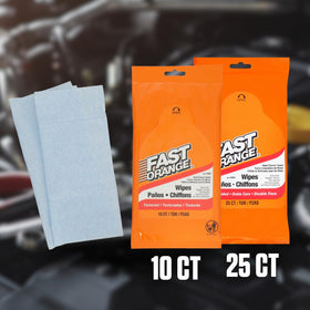 Fast Orange wipe cleaning greasy hands on a mechanic, showing effective on-the-job cleanup