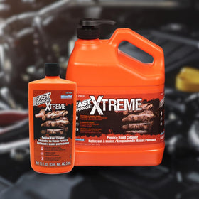 Fast Orange Xtreme gallon next to a wrench for scale demonstrating large refillable size