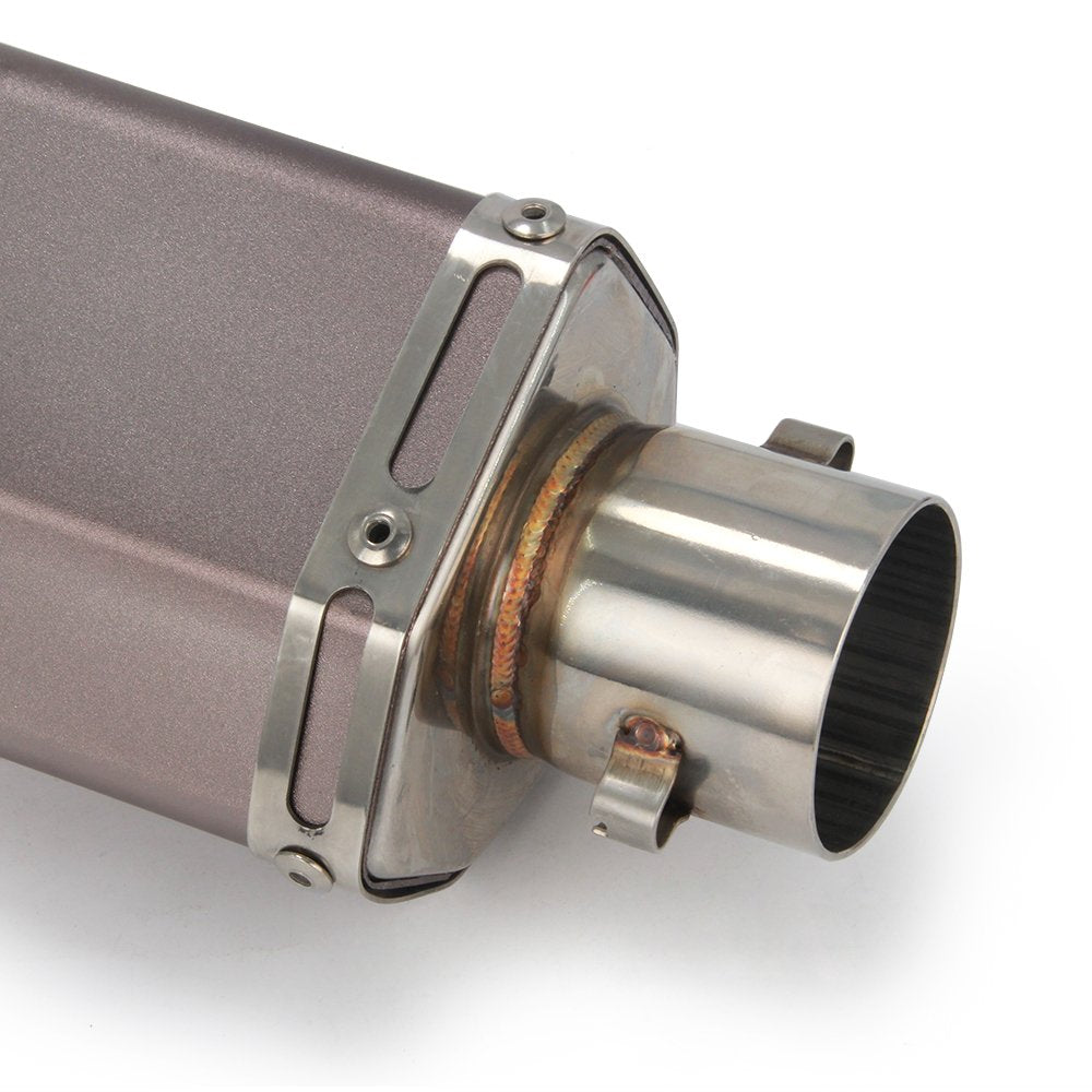 Fast Pro muffler beside ruler for scale showing 390mm compact length