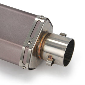 Fast Pro muffler beside ruler for scale showing 390mm compact length