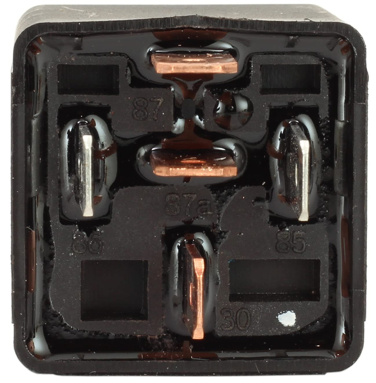 Fastronix relay next to coin for size comparison showing compact durable design