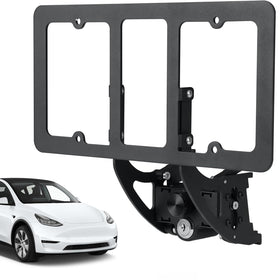 Femibon front-facing mounted on Tesla showing neat legal plate placement and preserved bumper