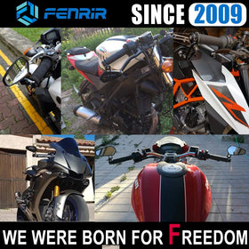 FENRIR mirror on motorcycle in urban setting showing real-world riding benefit
